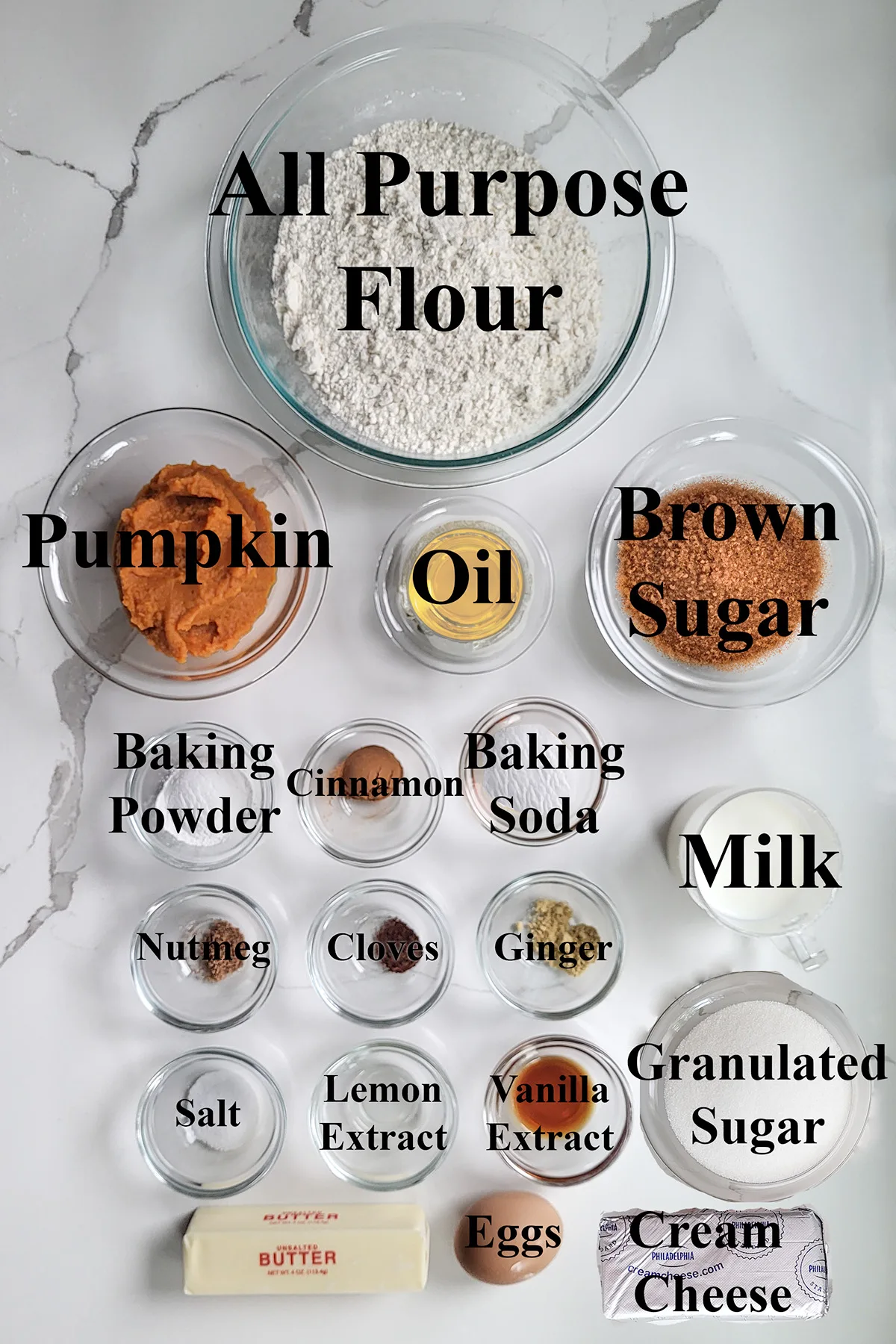 ingredients for pumpkin whoopie pies in glass bowls.