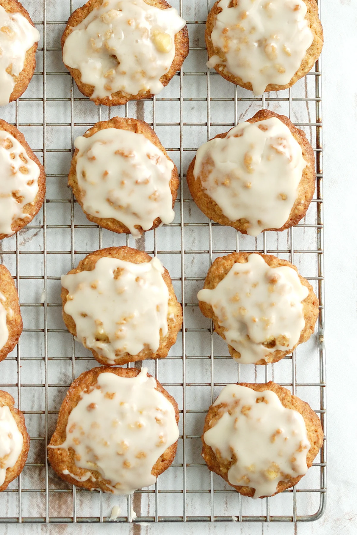 apple oatmeal cookies on a cooling rack.