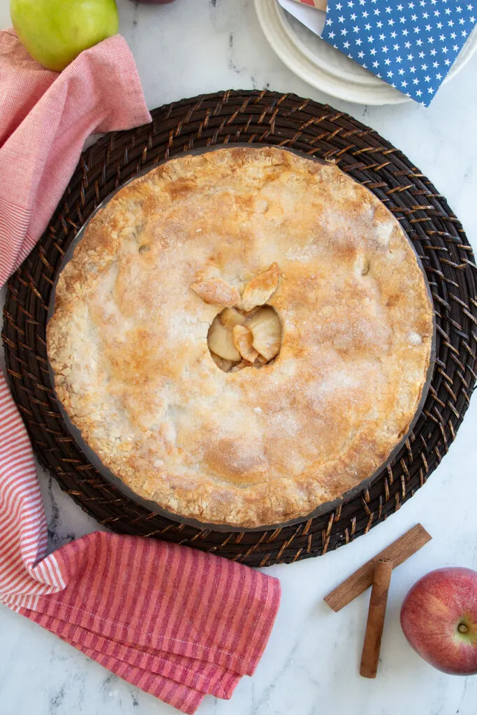 an apple pie on a table.