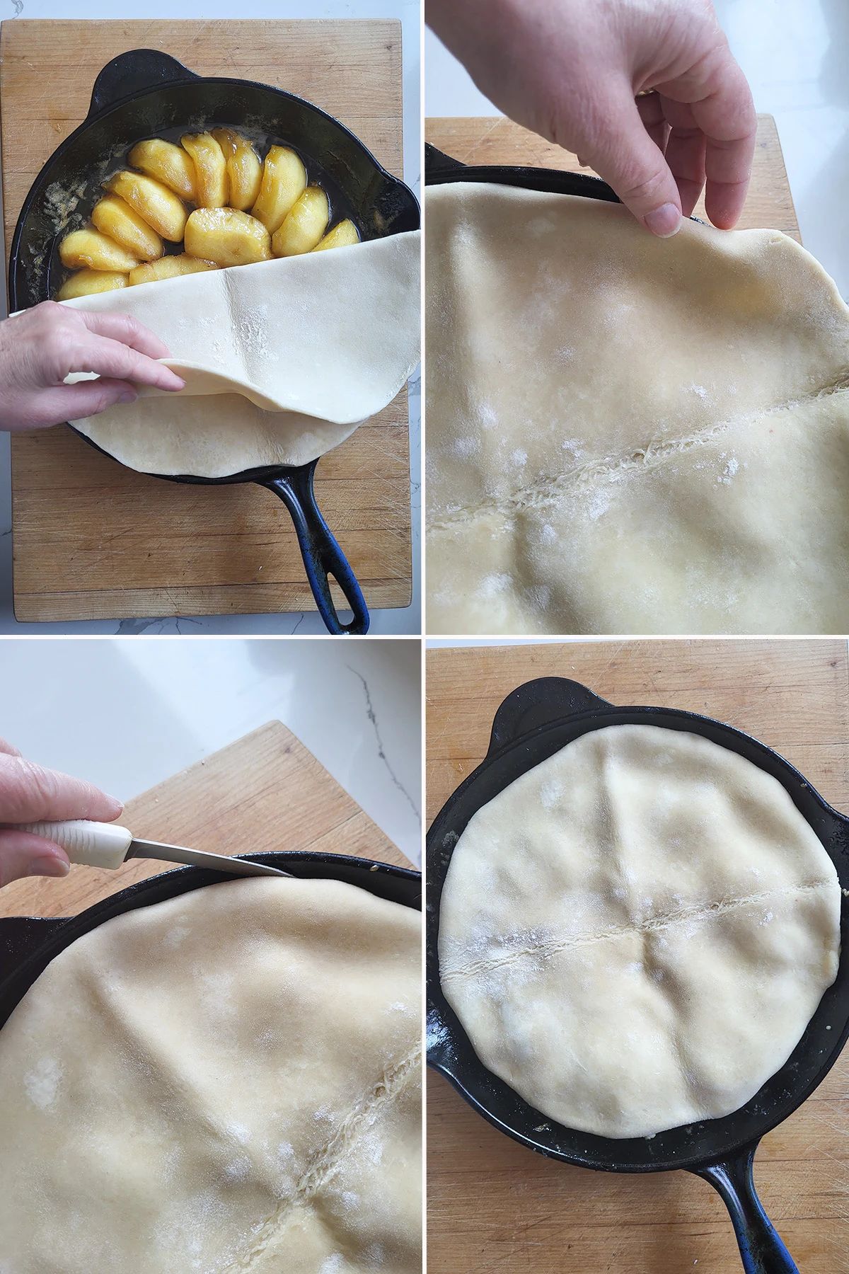 Caramelized apples in a pan with dough on top.