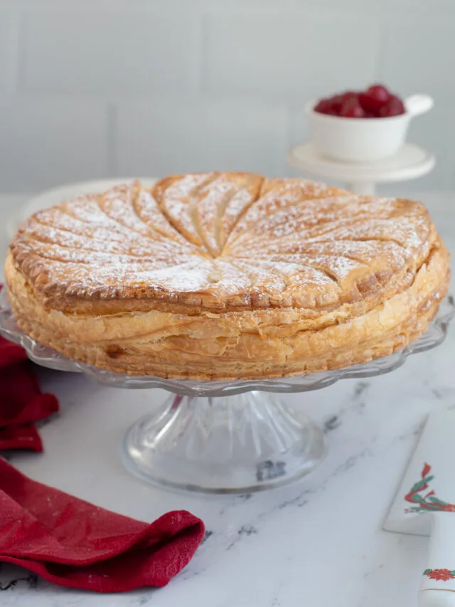 a puff pastry cake on a plate.