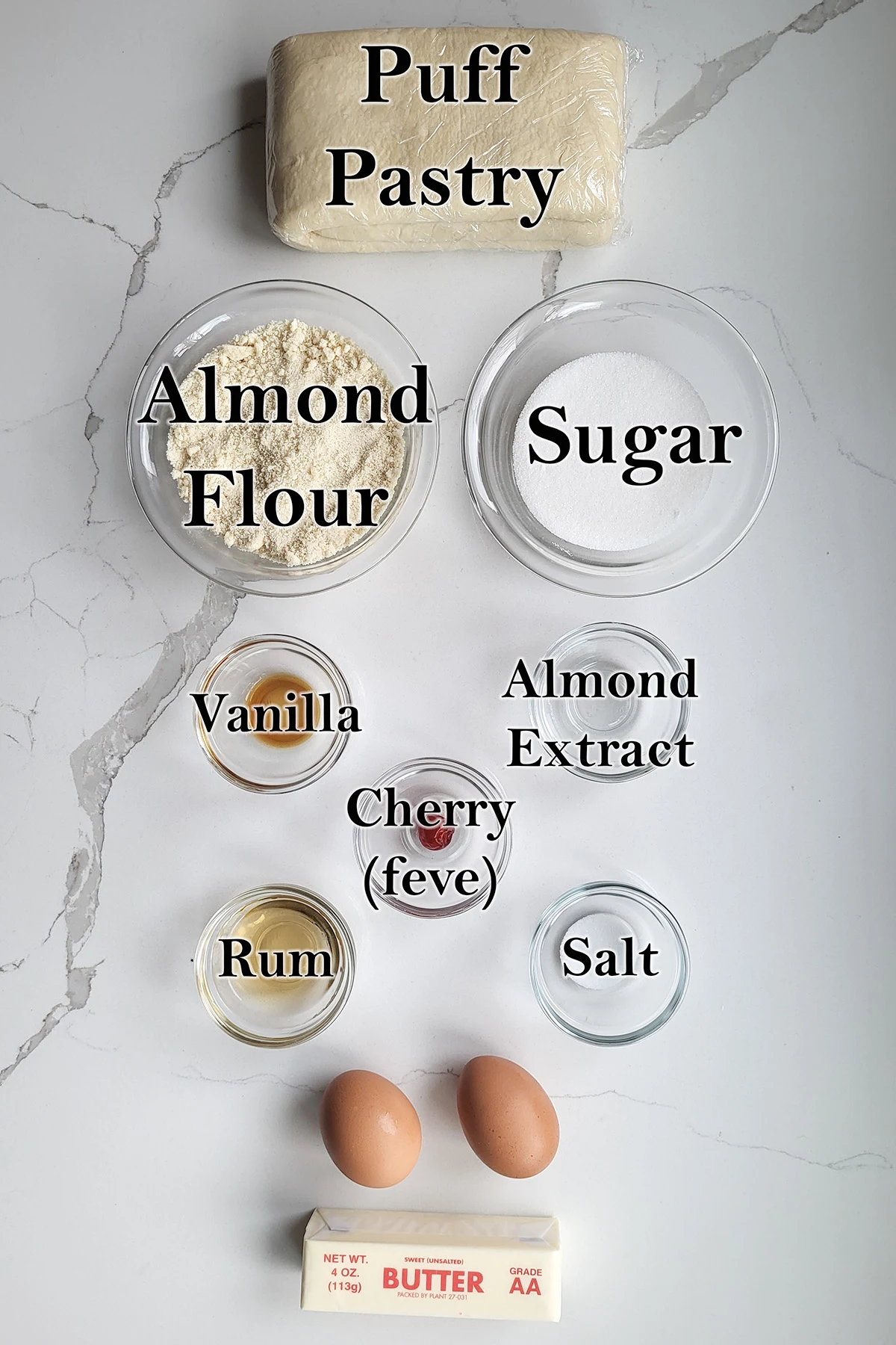 ingredients for galette des rois in glass bowls.