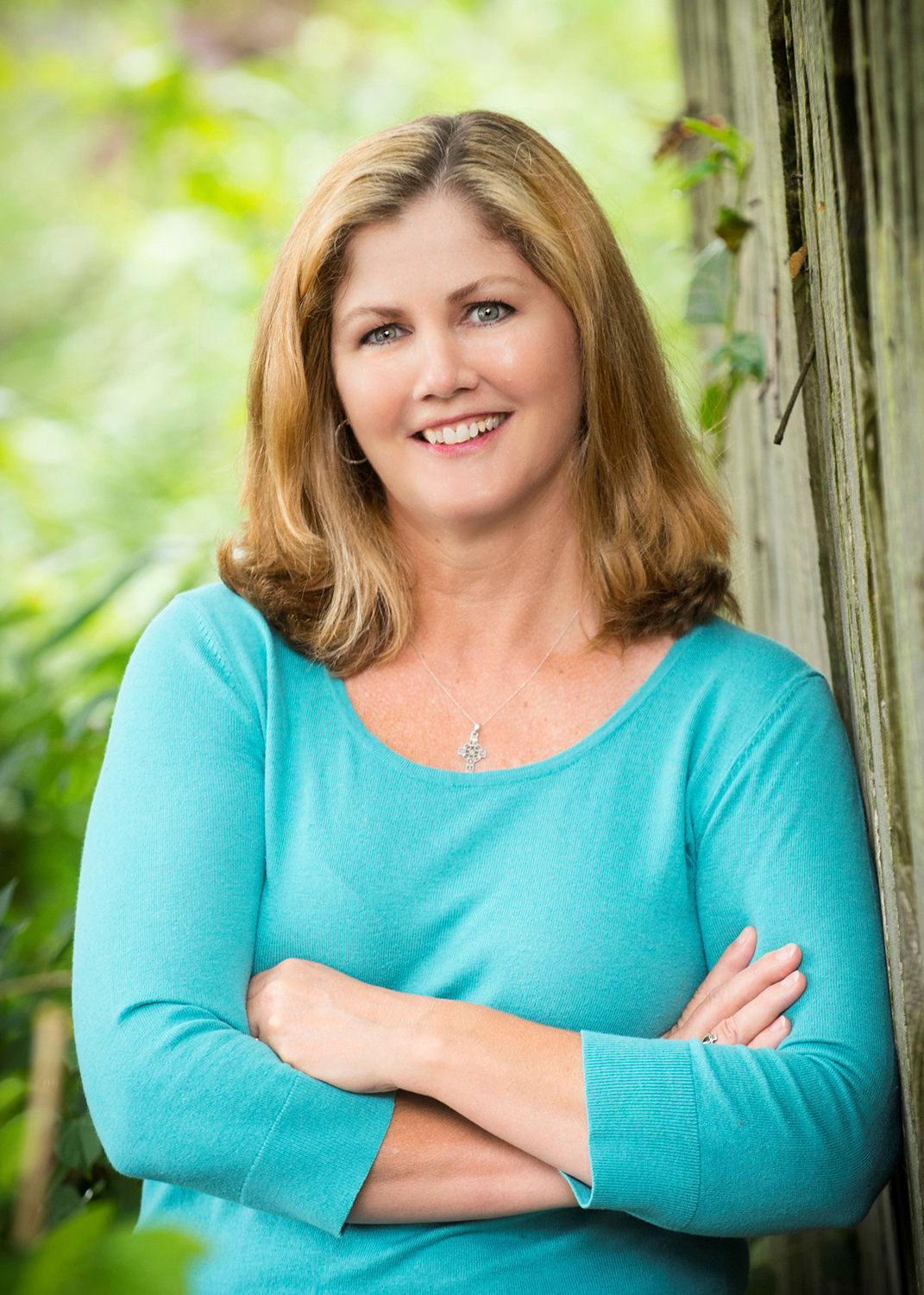 woman in a blue sweater.
