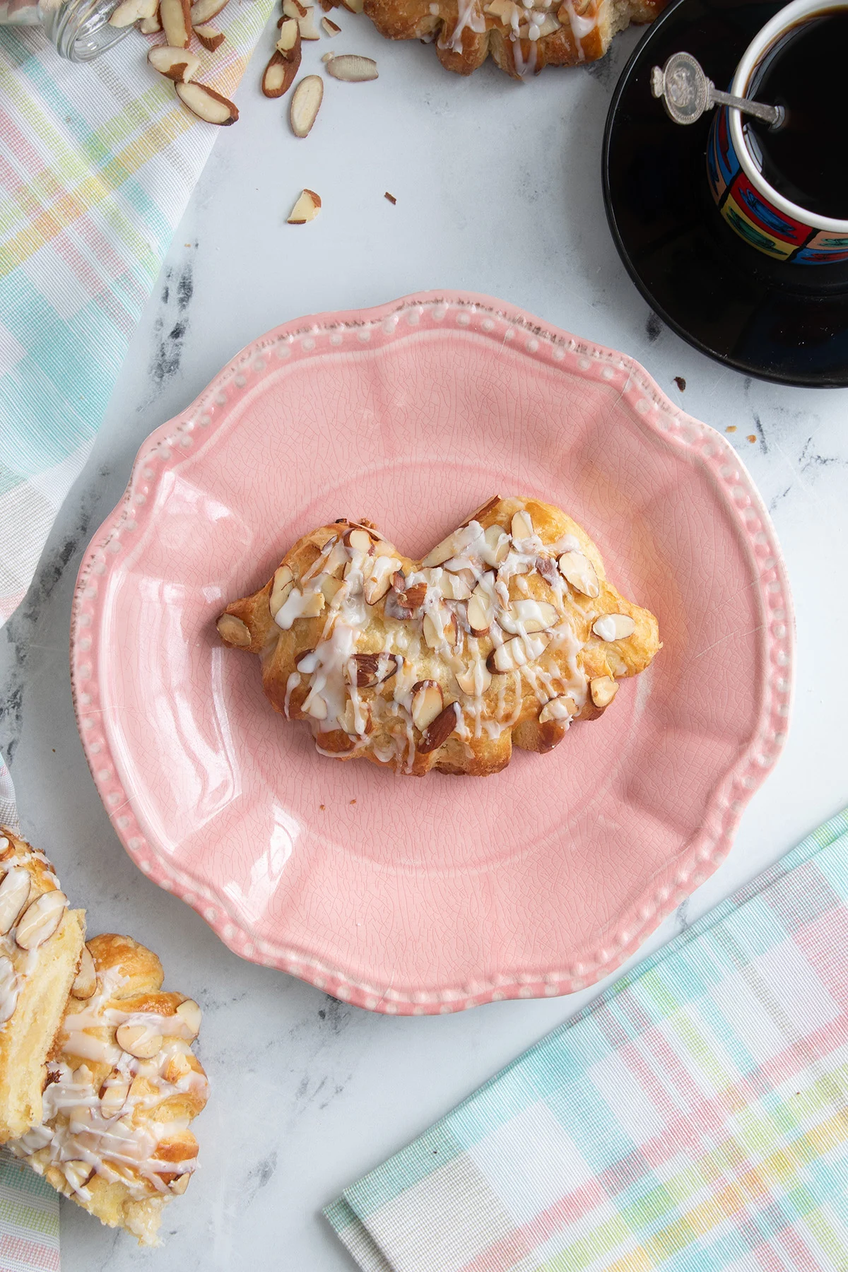 These scrumptious Bear Claw Pastries are made with real Danish pastry dough and a luscious almond filling. You can let the pastries rise in the refrigerator overnight and bake first thing in the morning.