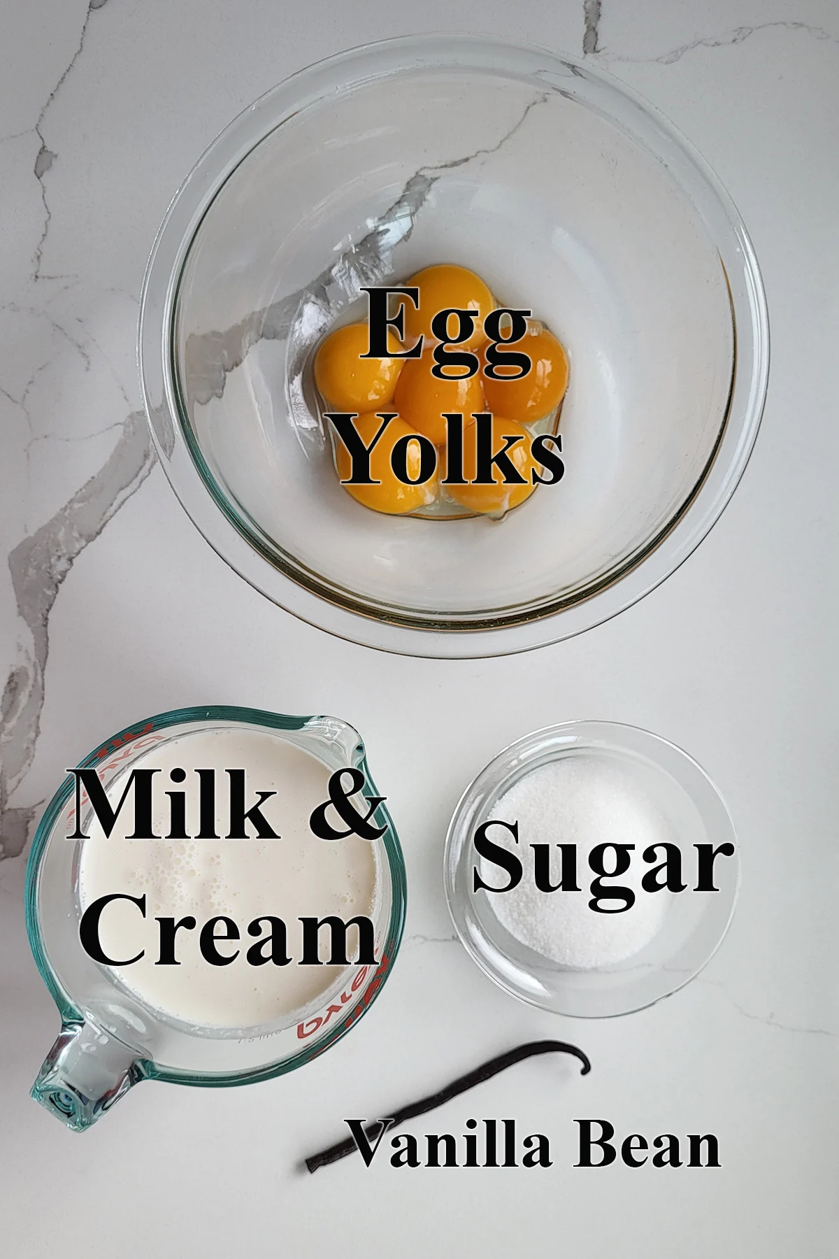 ingredients for creme anglaise in glass bowls.