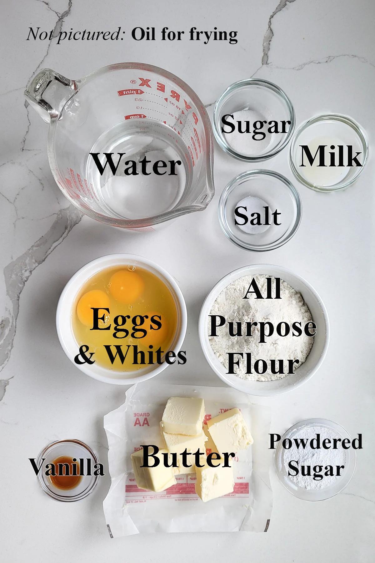 ingredients for making french crullers in glass bowls.