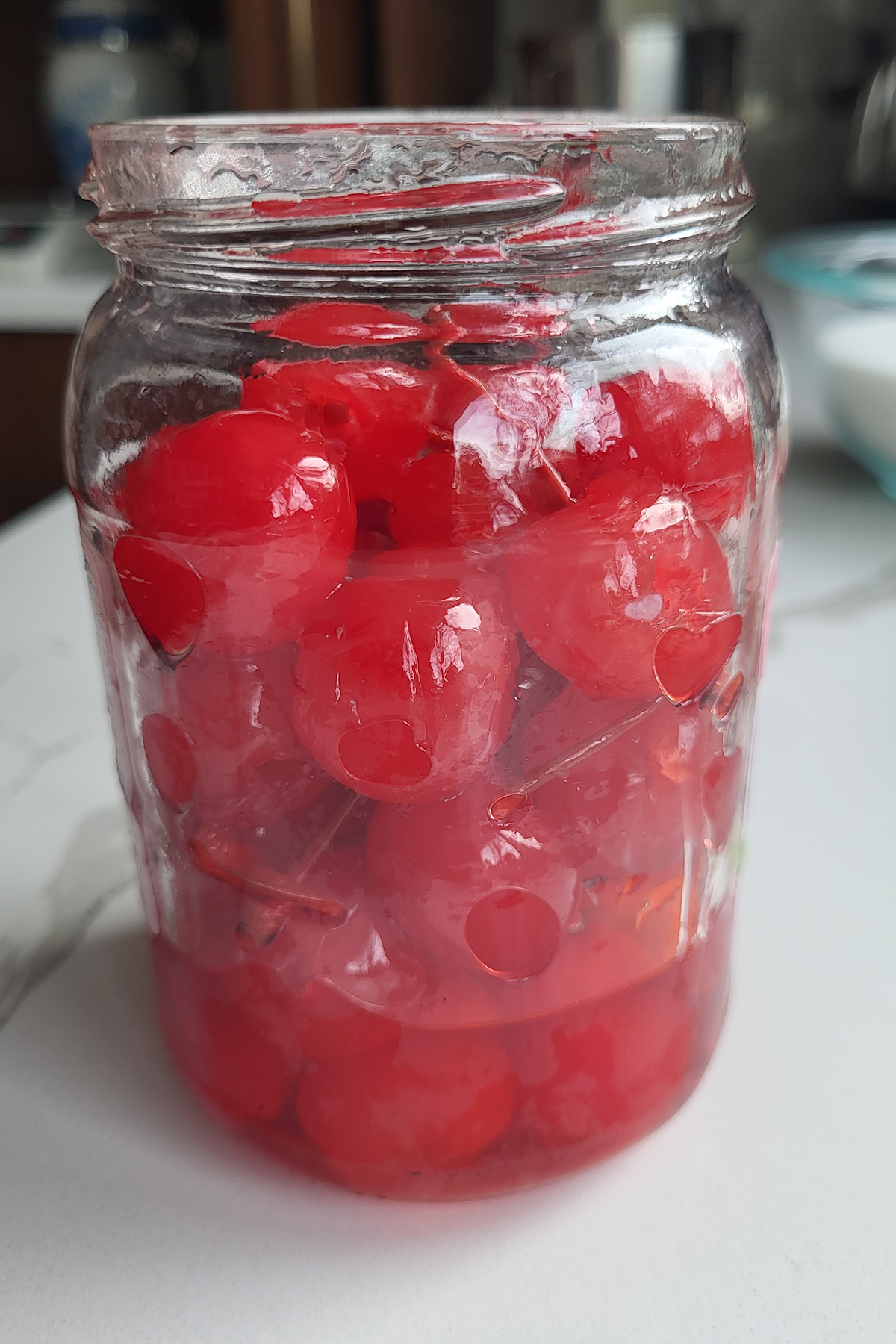a jar of maraschino cherries.