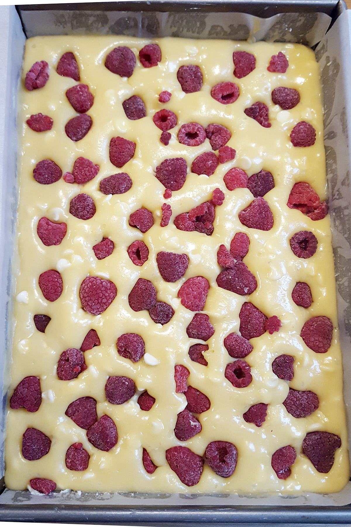 white chocolate brownie batter in a pan.