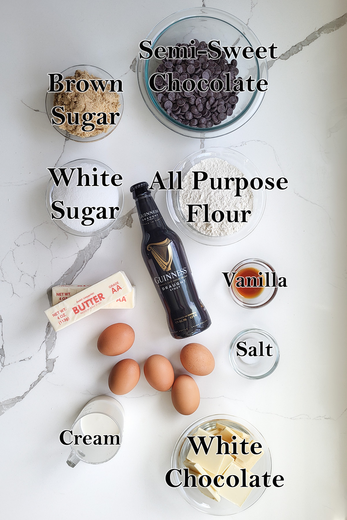 ingredients for guinness brownies in glass bowls.