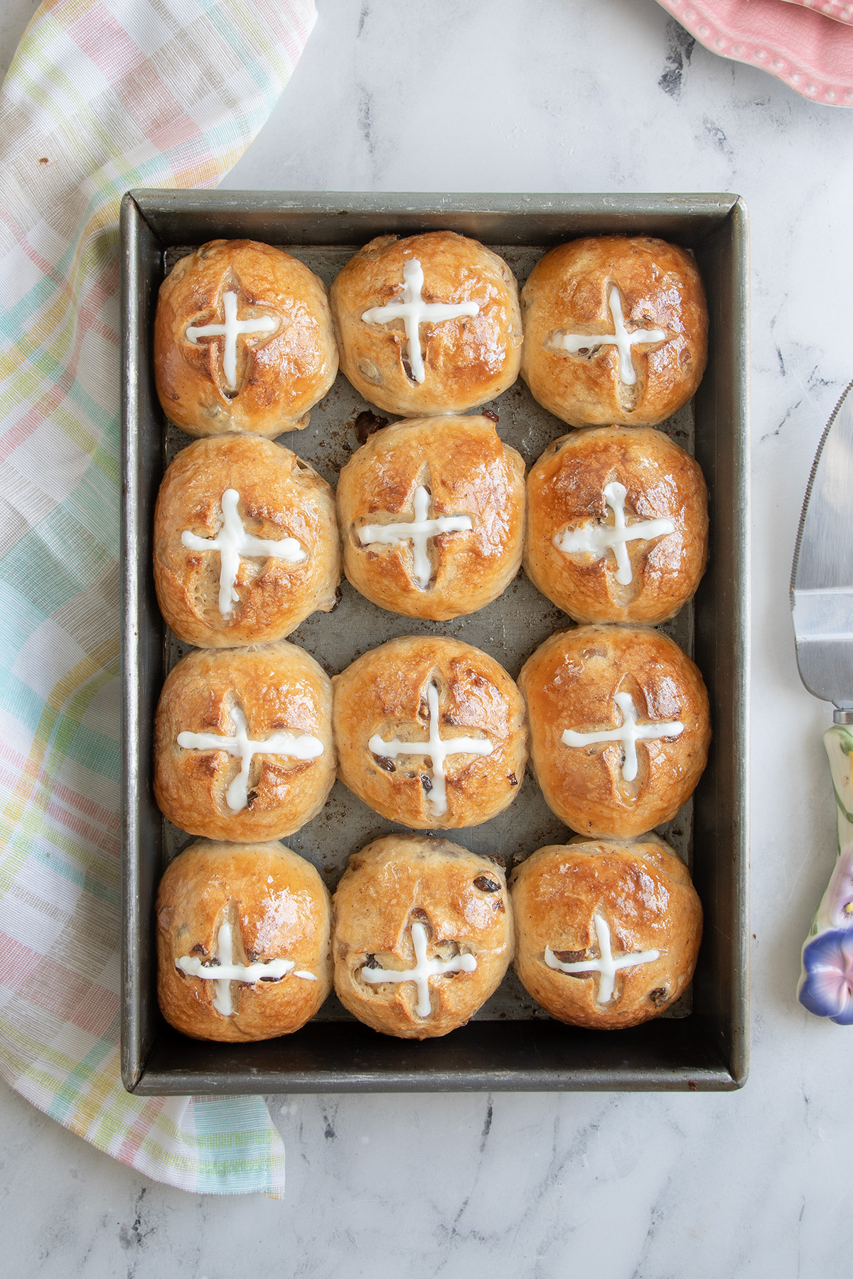 a pan filled with hot cross buns.