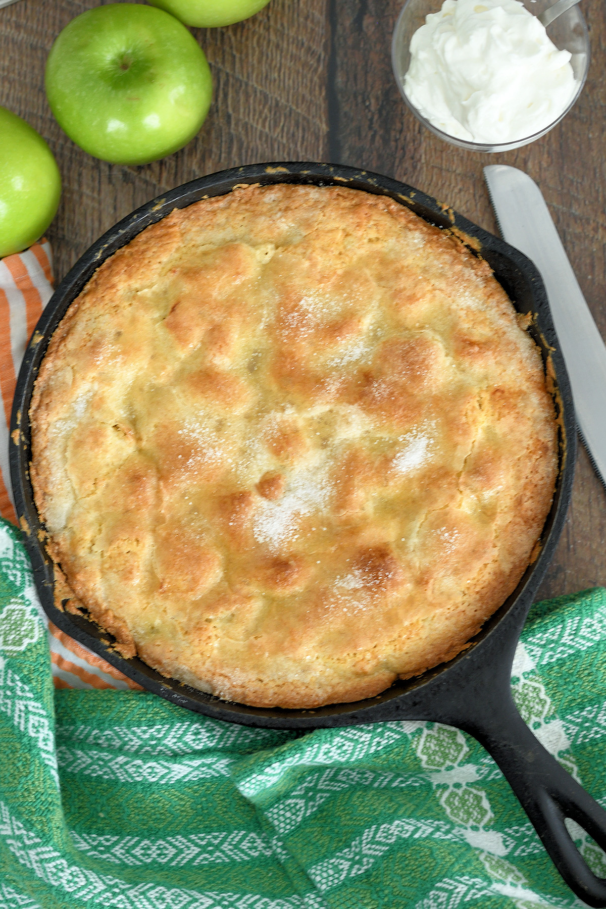 an irish apple cake in a cast iron skillet.