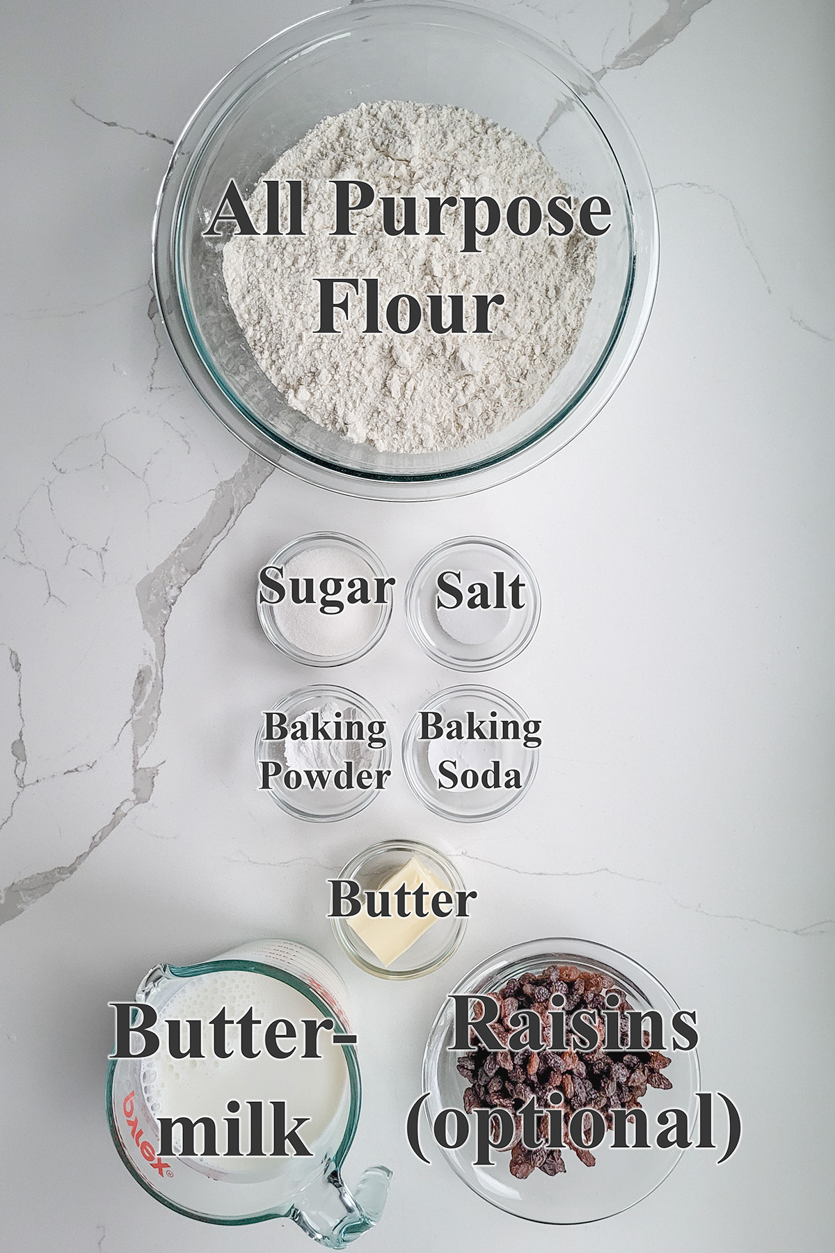 ingredients for irish soda bread in glass bowls.