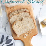 a pinterest image for sourdough oatmeal bread with text overlay.