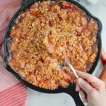 a pinterest image for rhubarb crisp with text overlay.