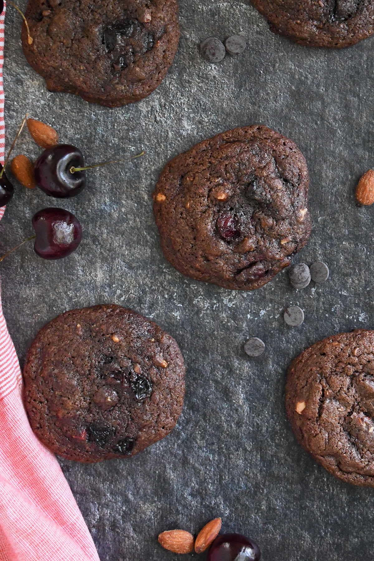 chocolate cherry cookies on a gray surface. 