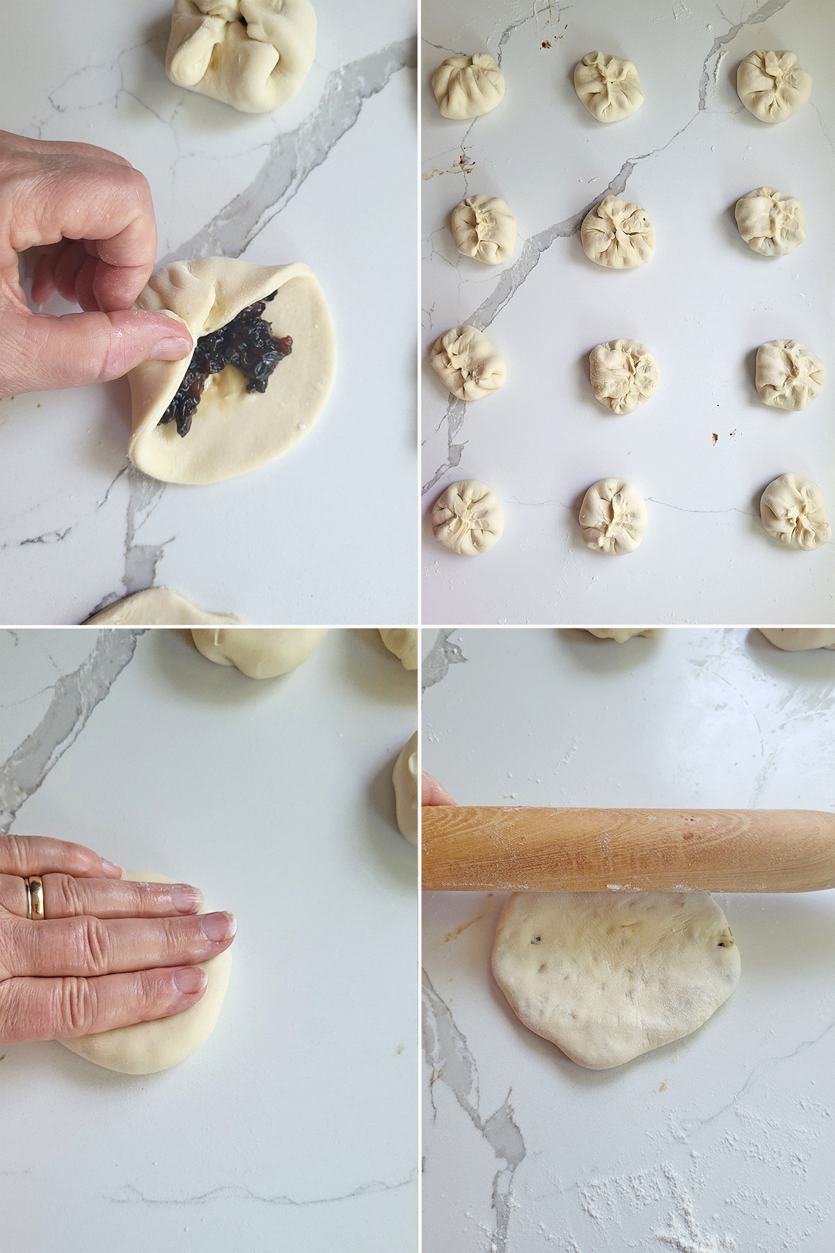a hand folding dough over currant filling. 12 filled buns on a white surface. A hand flattening a bun. A rolling pin on a bun,