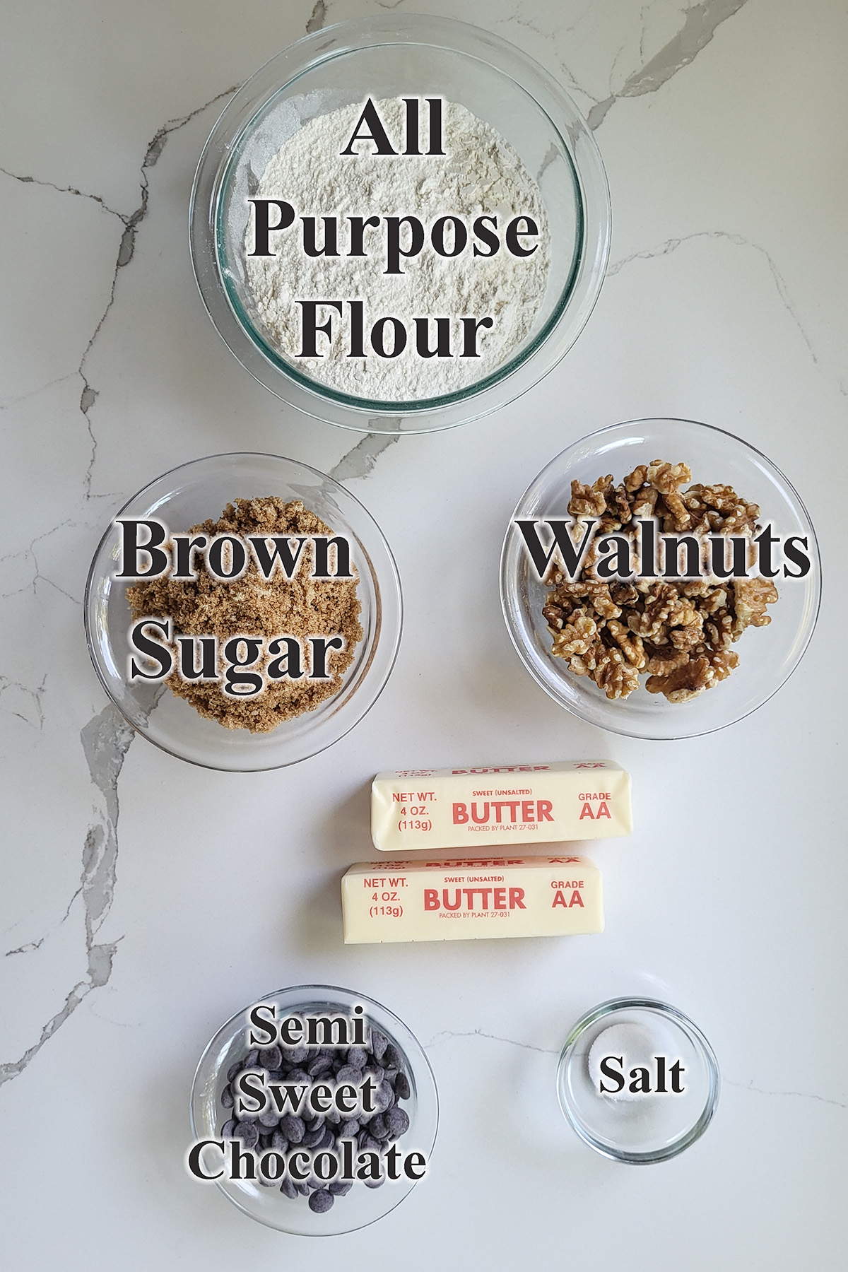 ingredients for walnuts shortbread in glass bowls.