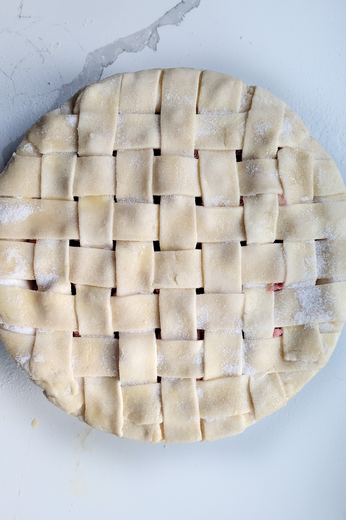 a lattice top pie. unbaked.