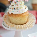 a pinterest image for vanilla cupcakes with text overlay.