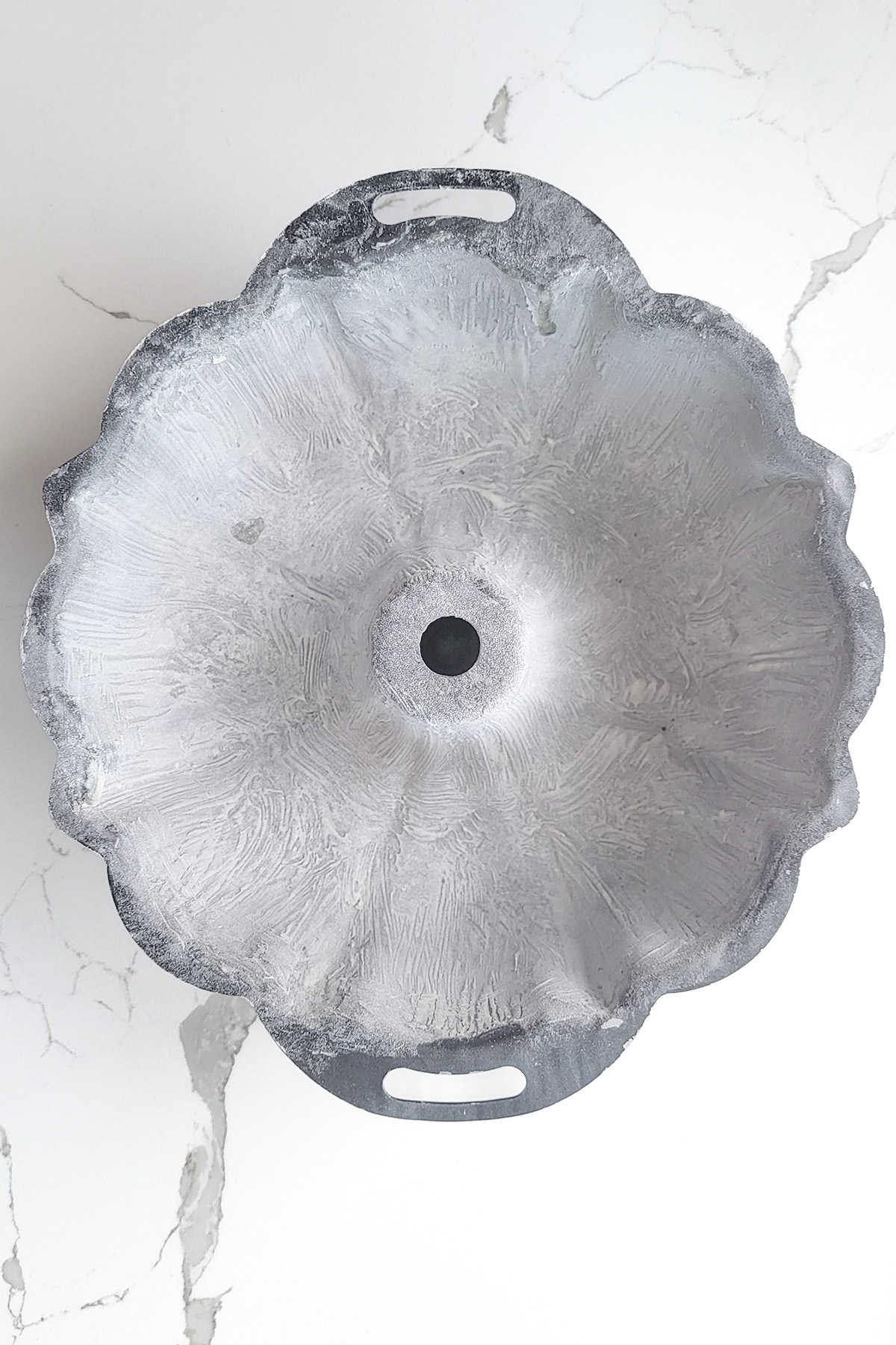 a buttered and floured bundt pan.