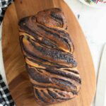 a pinterest image for sourdough babka with text overlay.