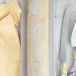 a pinterest image for lemon swiss roll recipe with text overlay.