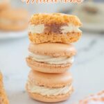 a pinterest image for french orange macarons with text overlay.