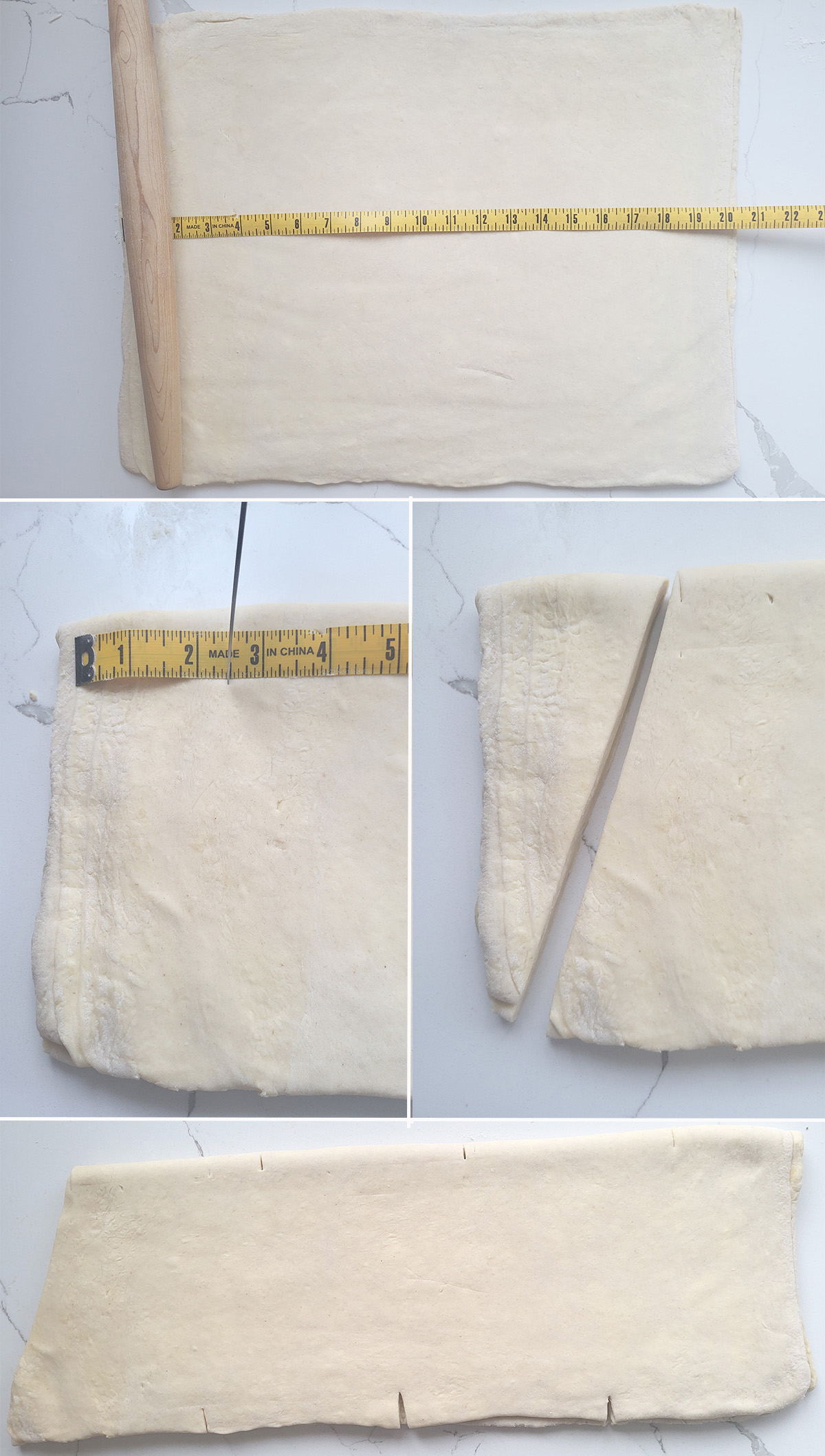 Folding and measuring croissant dough on a white surface.