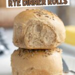 a pinterest image for soft sourdough rye dinner rolls with text overlay.