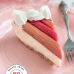 A close up slice of rhubarb cheesecake showing the creamy custardy texture and roasted rhubarb topping