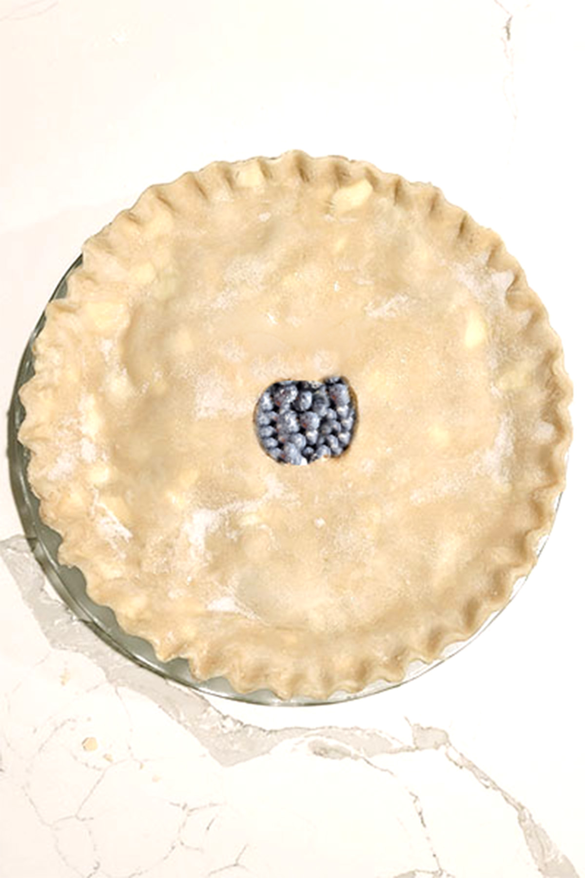 an unbaked blueberry pie.
