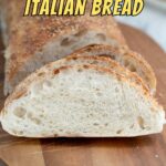 a slice of sourdough italian bread on a cutting board.