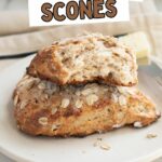 a whole and a half oatmeal scone on a plate.