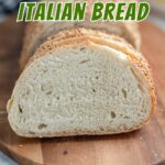 a slice of italian bread on a cutting board
