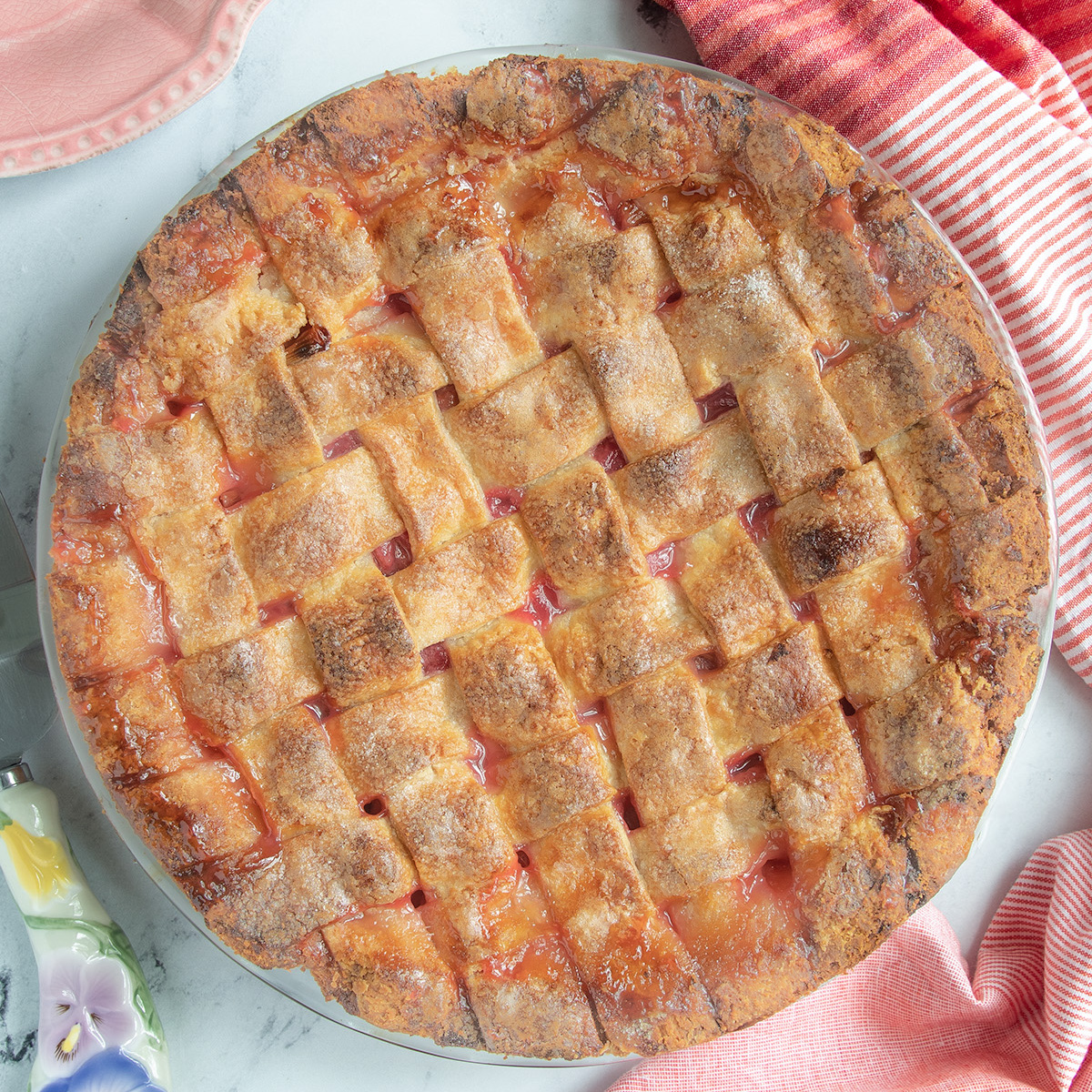 a lattice top rhubarb pie made with all butter crust